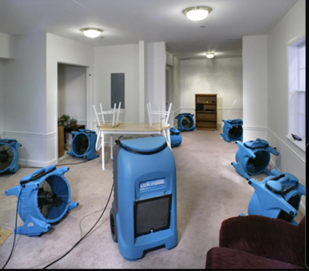 Air movers and dehumidifier setup for Water Damage Restoration in Shady Hollow